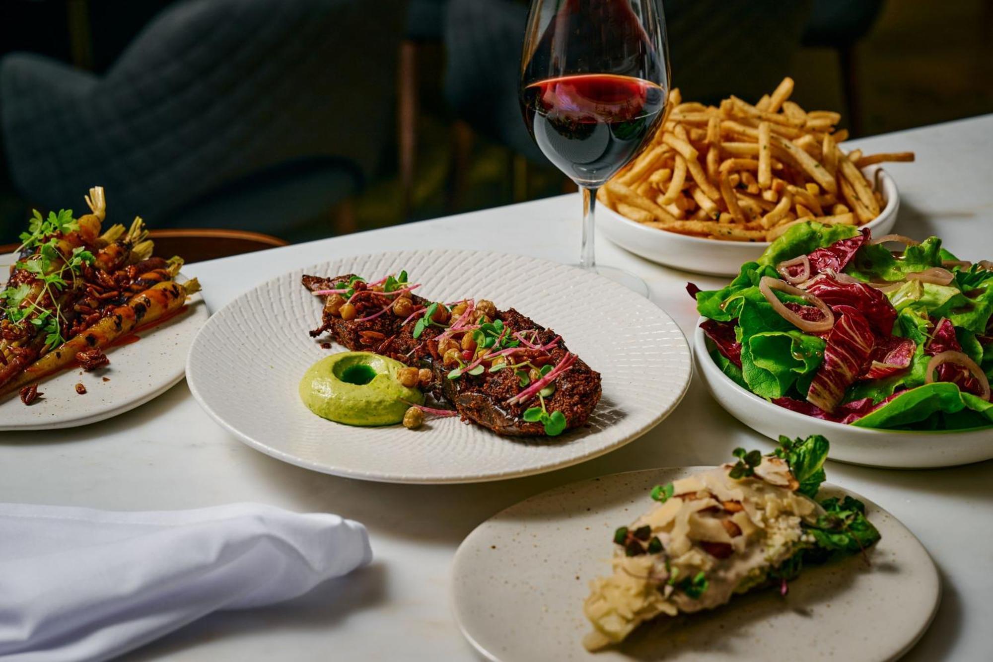 Sheraton Melbourne Hotel Exterior photo A selection of dishes at the restaurant